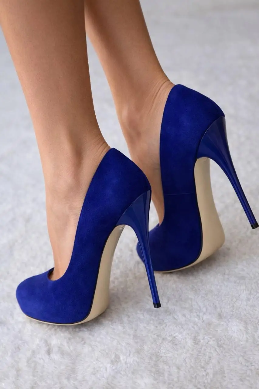Royal blue suede platform pumps with a patent heel
