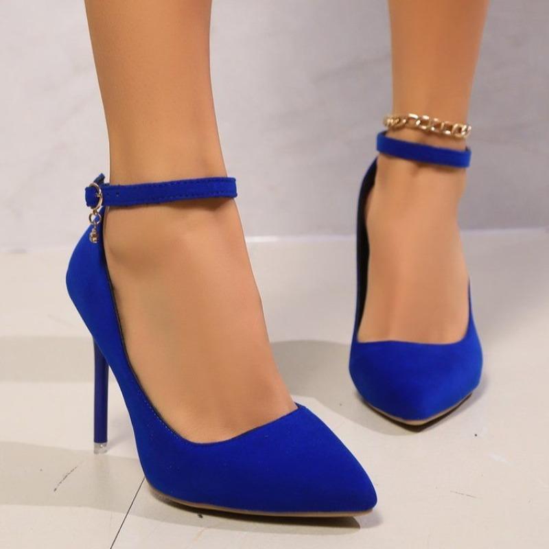 Royal blue suede ankle-strap stilettos with a small charm